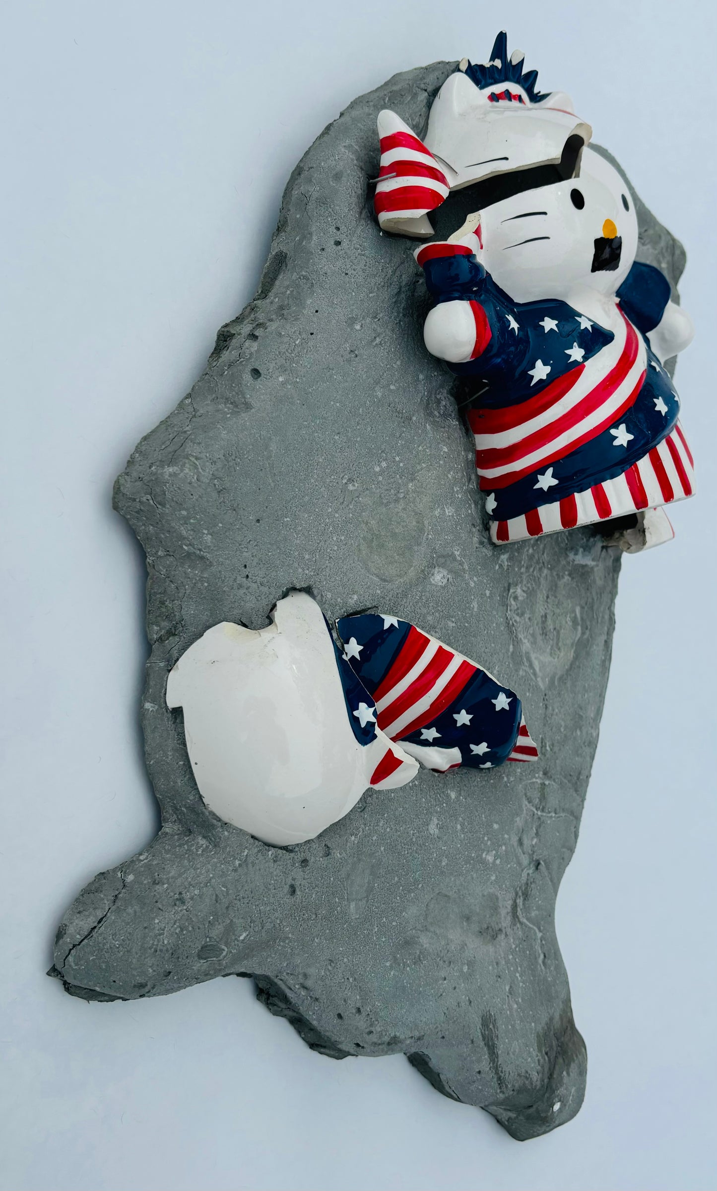 “Kitty Corrupted”: Mustachioed Hello Kitty White on USA Wall Sculpture