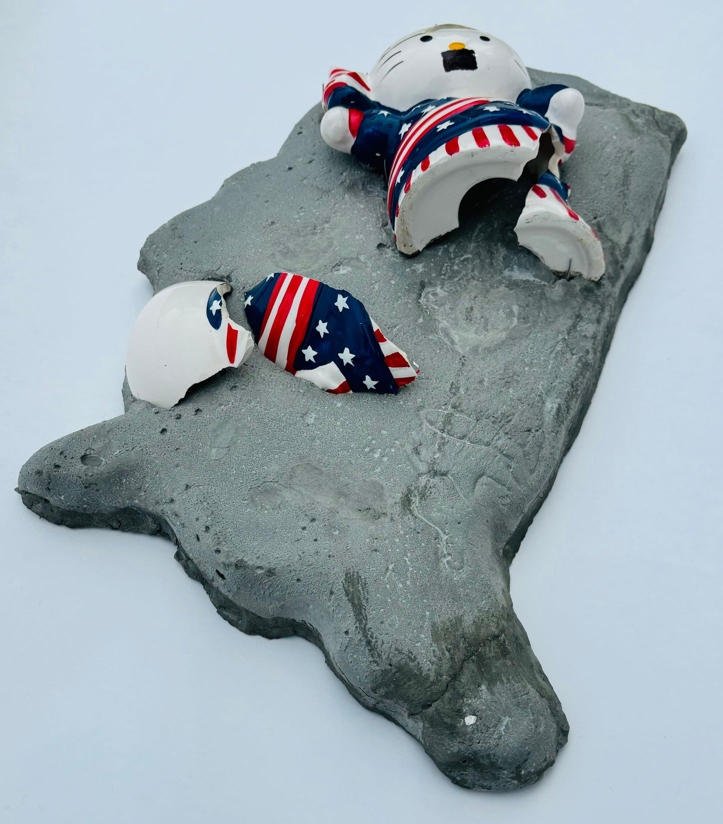 “Kitty Corrupted”: Mustachioed Hello Kitty White on USA Wall Sculpture