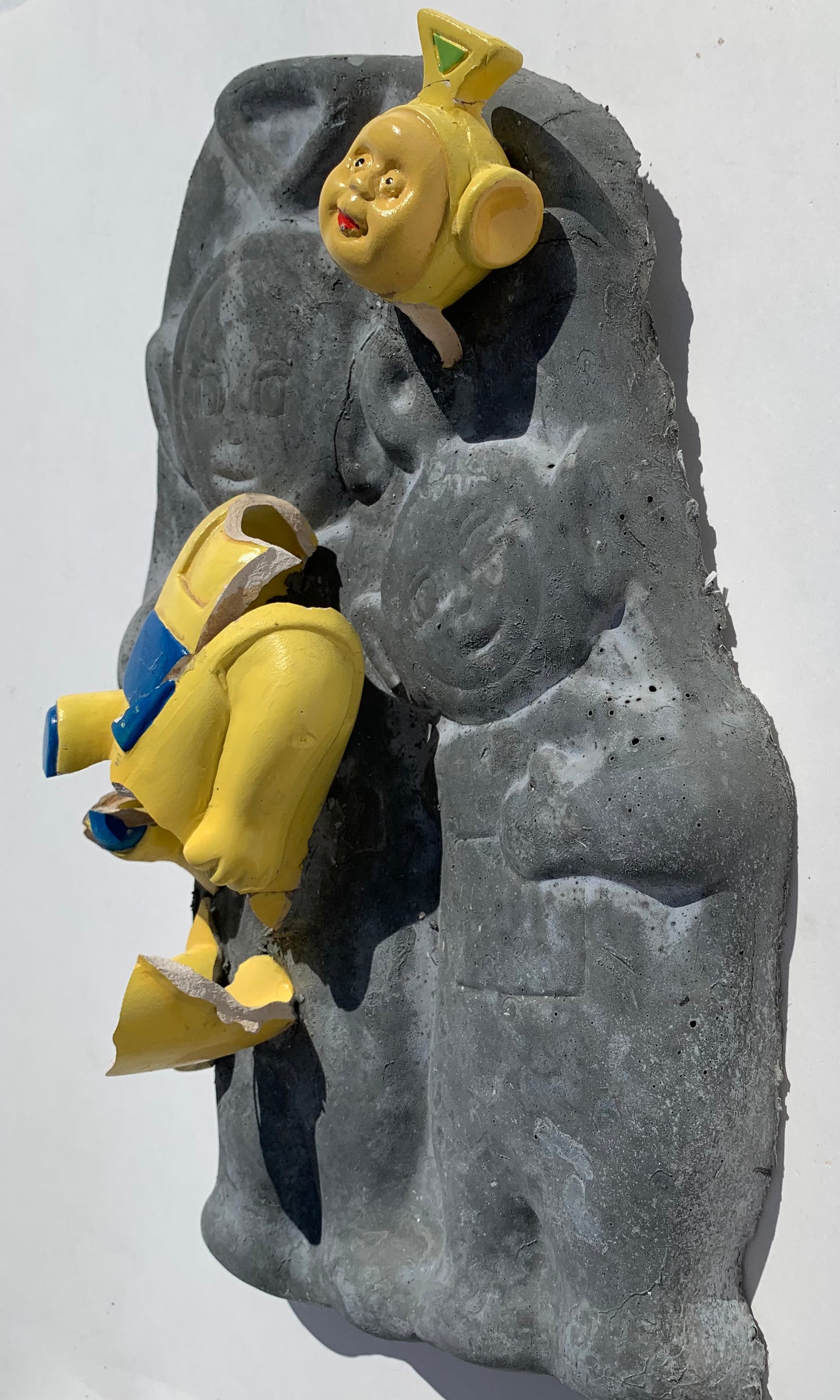 "Perils Of Pioneering": Yellow Tinky Winky on Teletubbies WallSculpture
