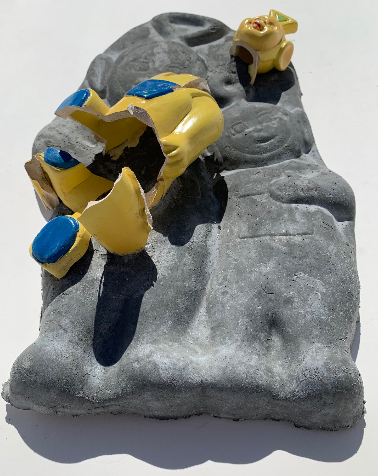 "Perils Of Pioneering": Yellow Tinky Winky on Teletubbies WallSculpture