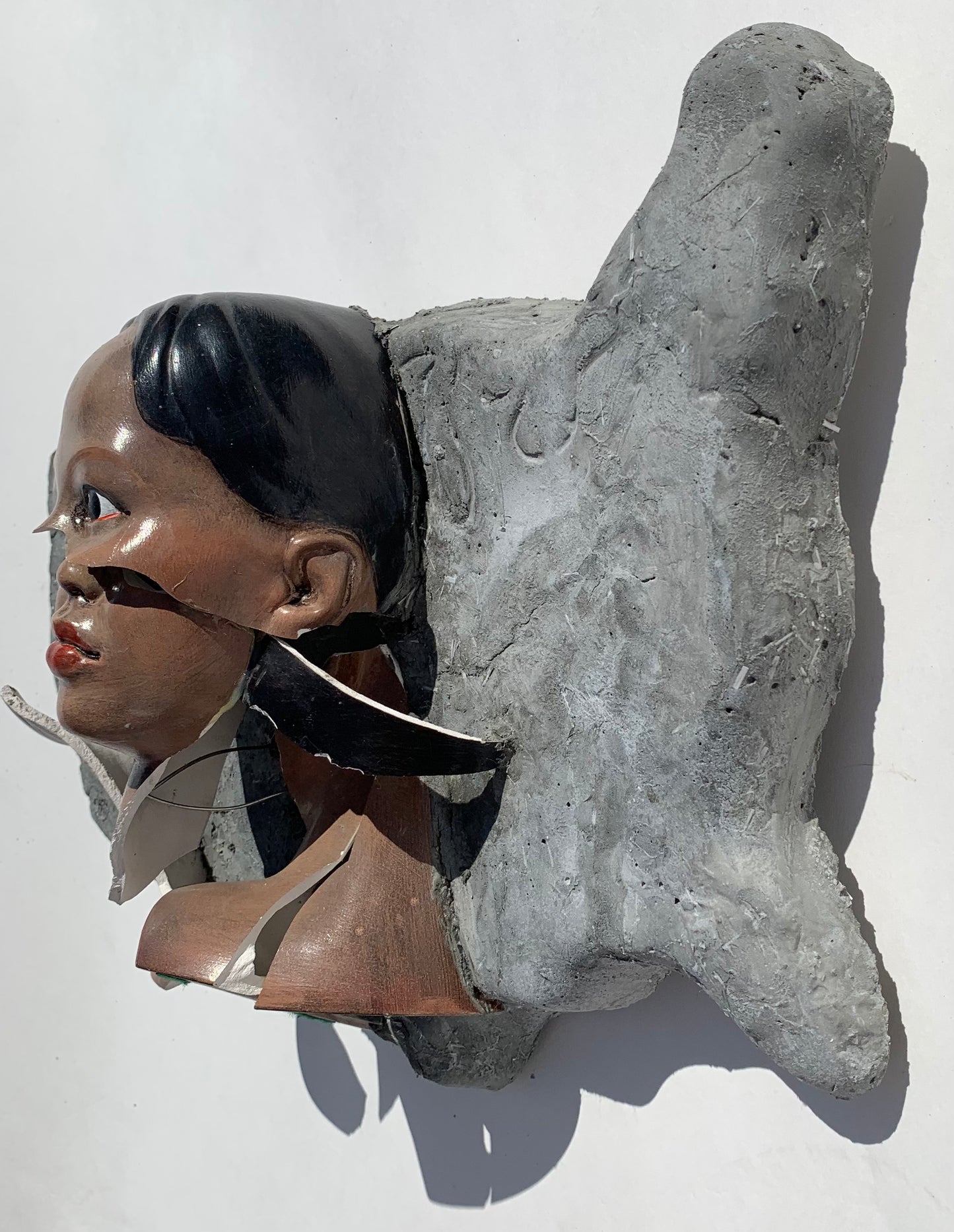 "American Migraine": Black Woman on USA Wall Sculpture