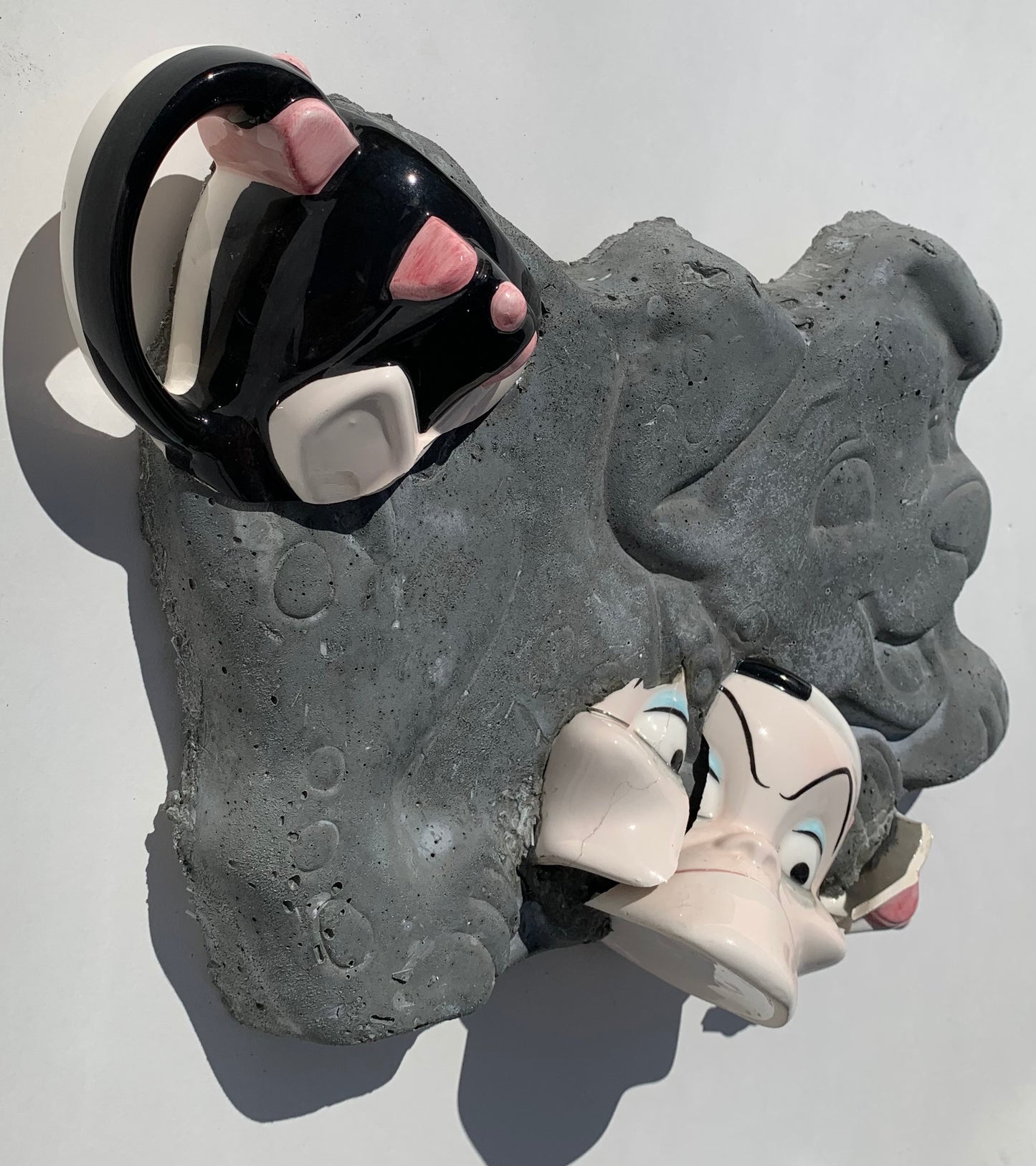 "Not Sweet on PEET": Cruella de Vil on Dalmatian Puppy Wall Sculpture