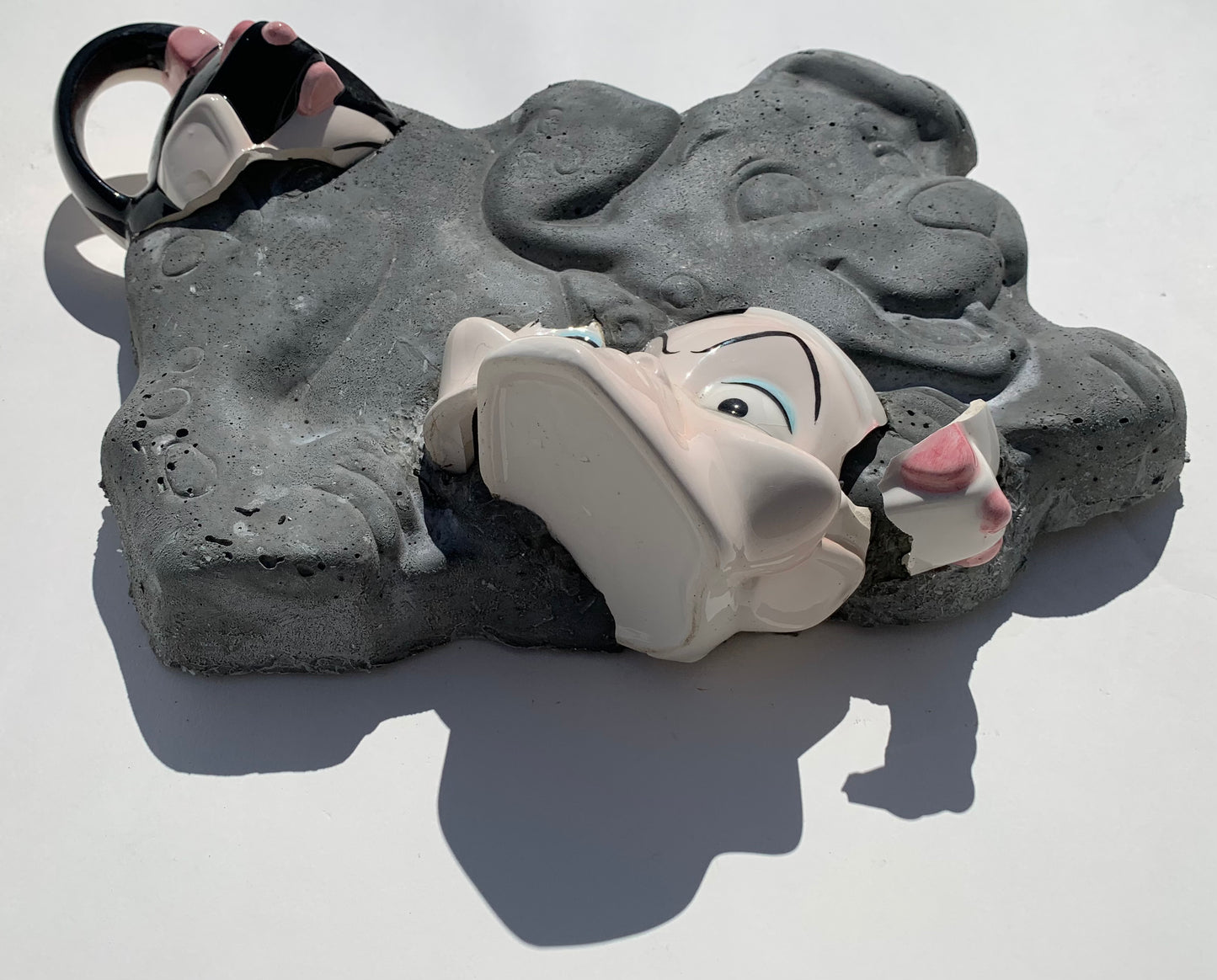 "Not Sweet on PEET": Cruella de Vil on Dalmatian Puppy Wall Sculpture