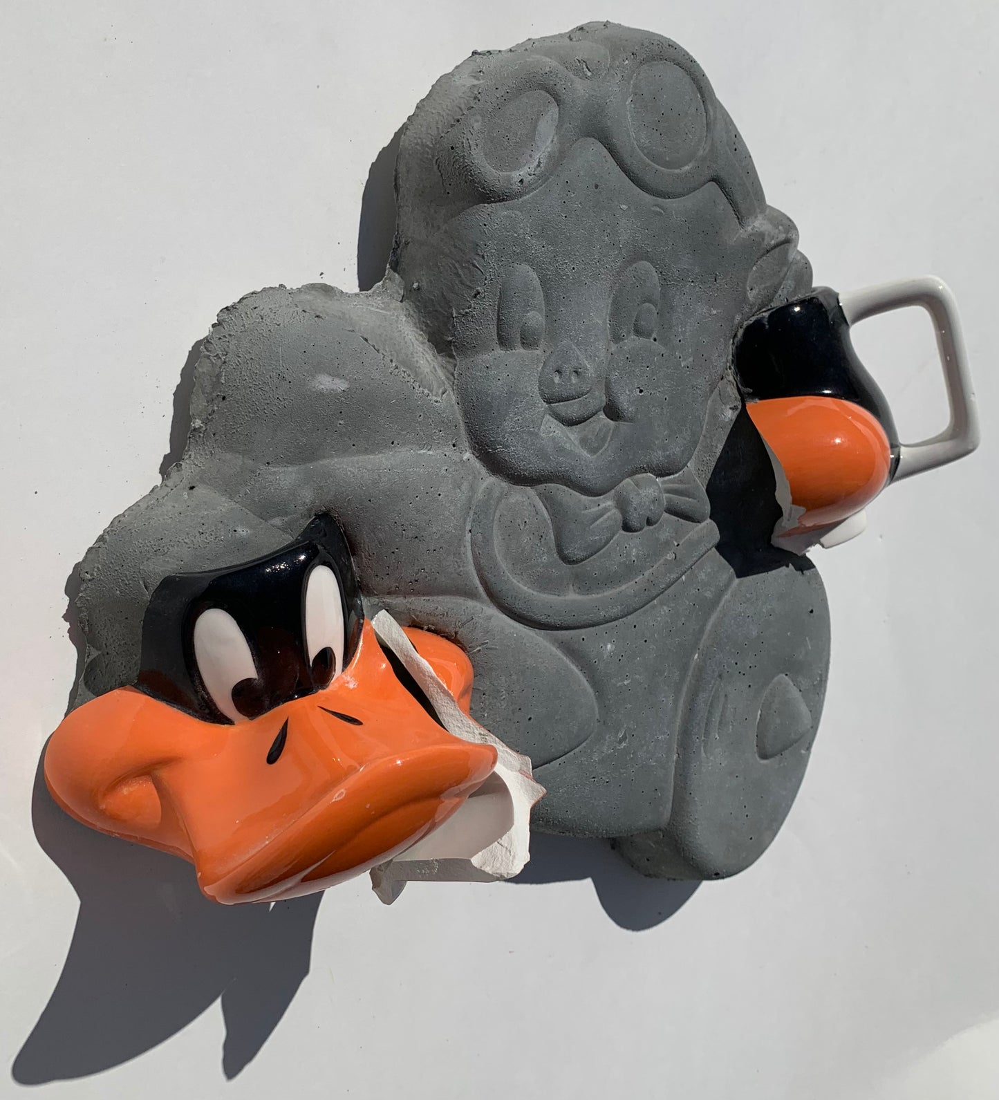 "Pilot Error": Daffy Duck on Porky Pig Wall Sculpture