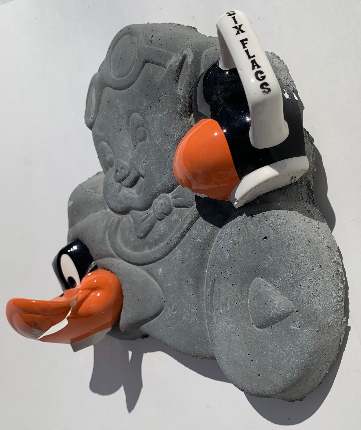 "Pilot Error": Daffy Duck on Porky Pig Wall Sculpture