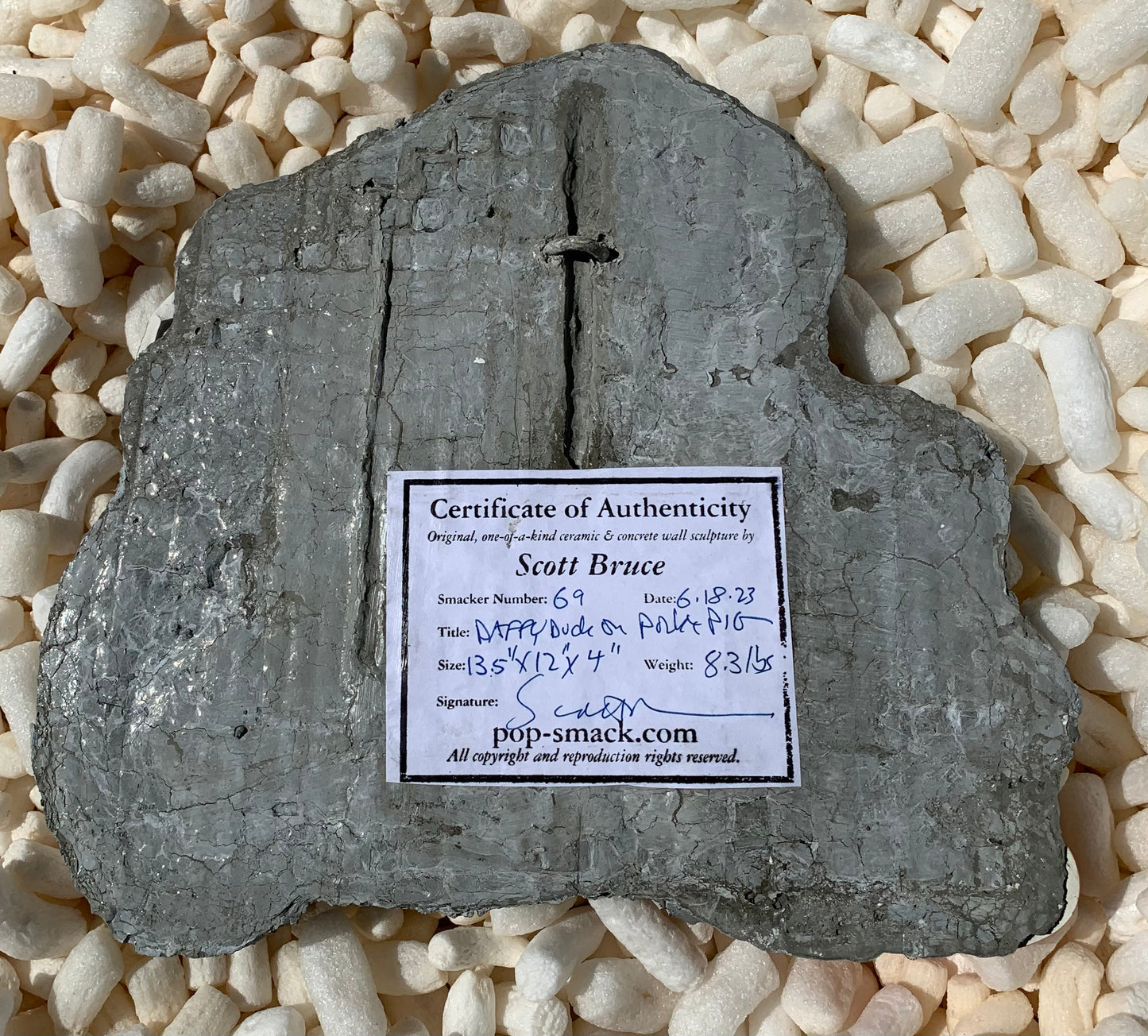 "Pilot Error": Daffy Duck on Porky Pig Wall Sculpture