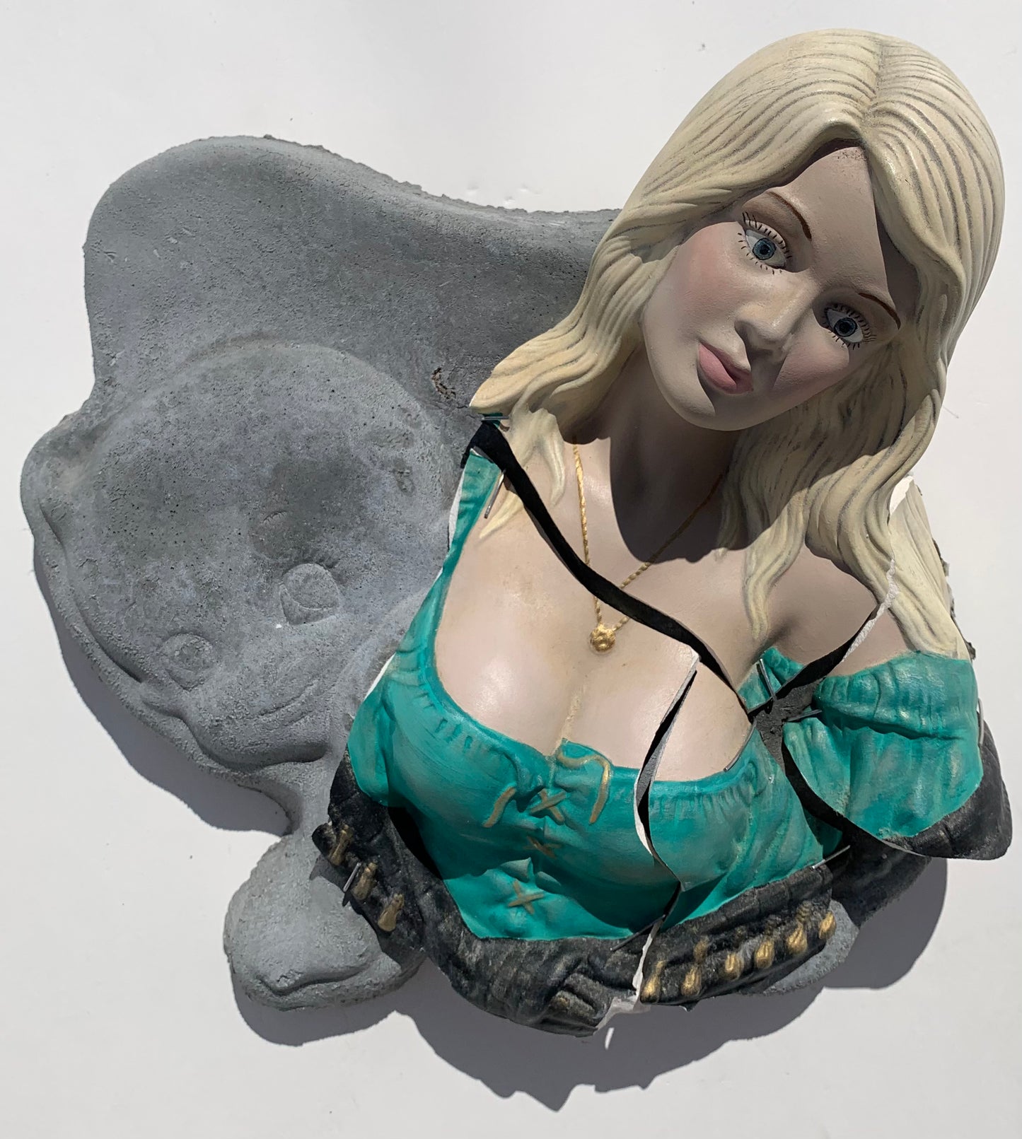 "Bad News": Blonde Woman on Crawling Baby Wall Sculpture