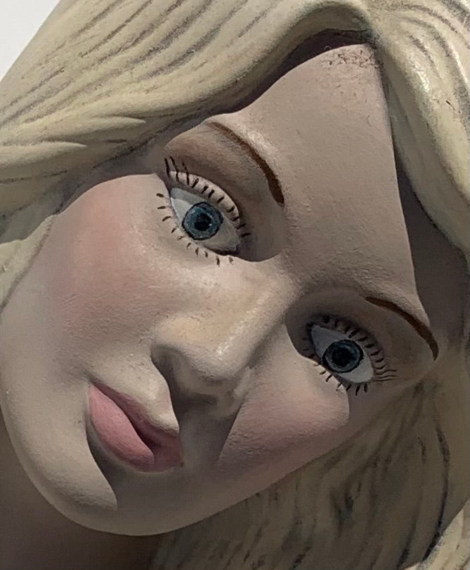 "Bad News": Blonde Woman on Crawling Baby Wall Sculpture