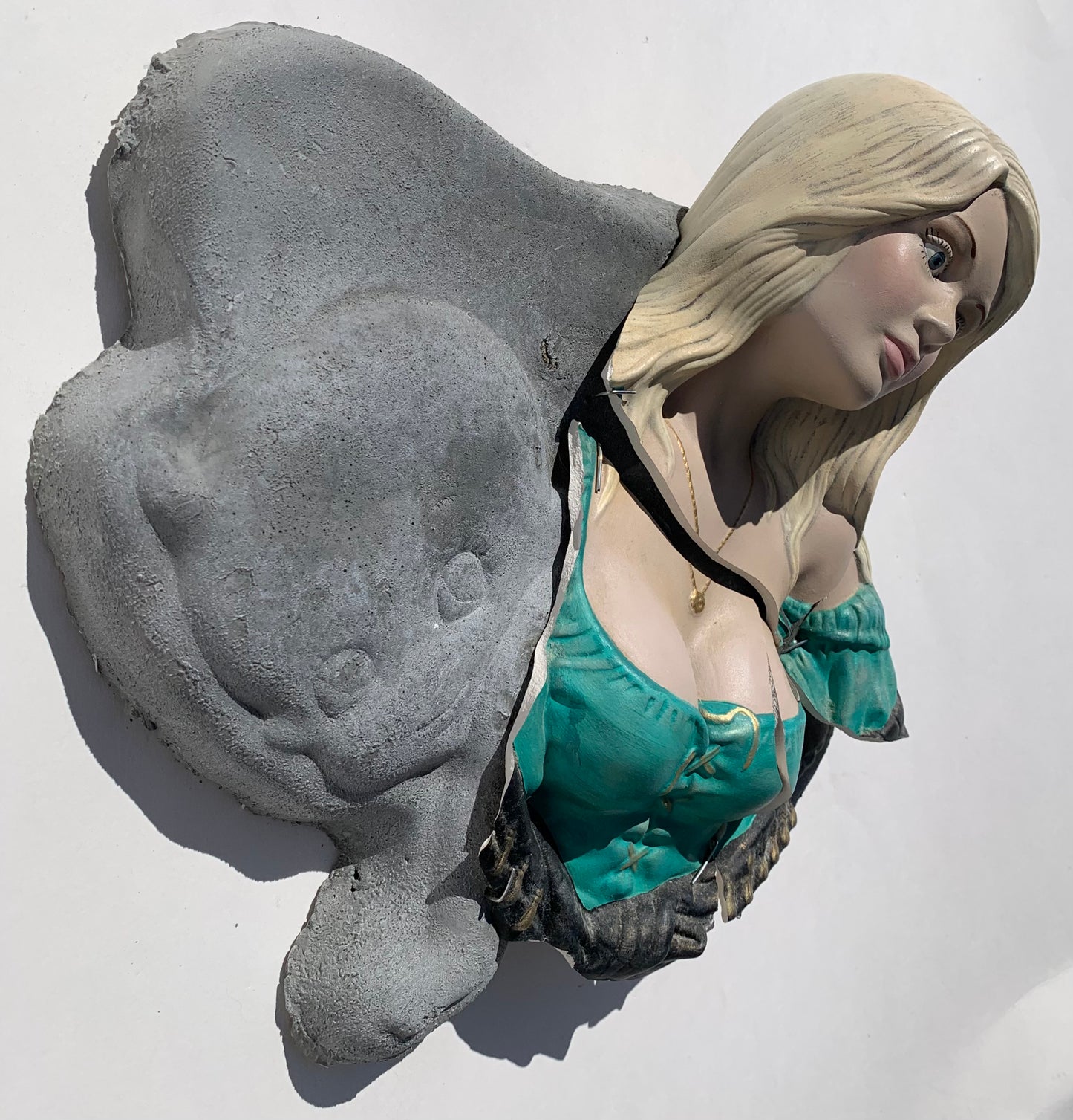 "Bad News": Blonde Woman on Crawling Baby Wall Sculpture