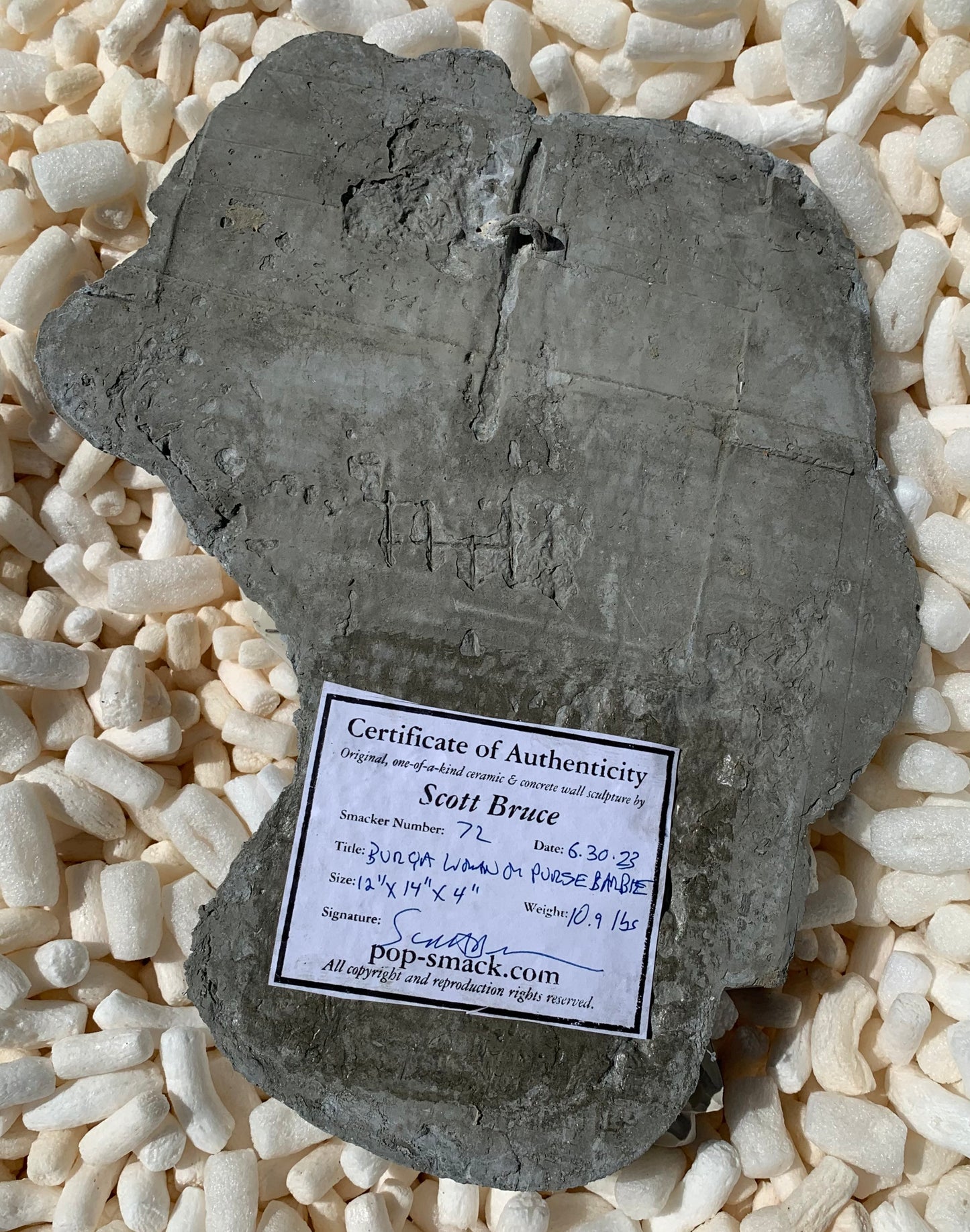 "Islam's Fatal Flaw": Burqa-veiled Woman on Barbie Wall Sculpture