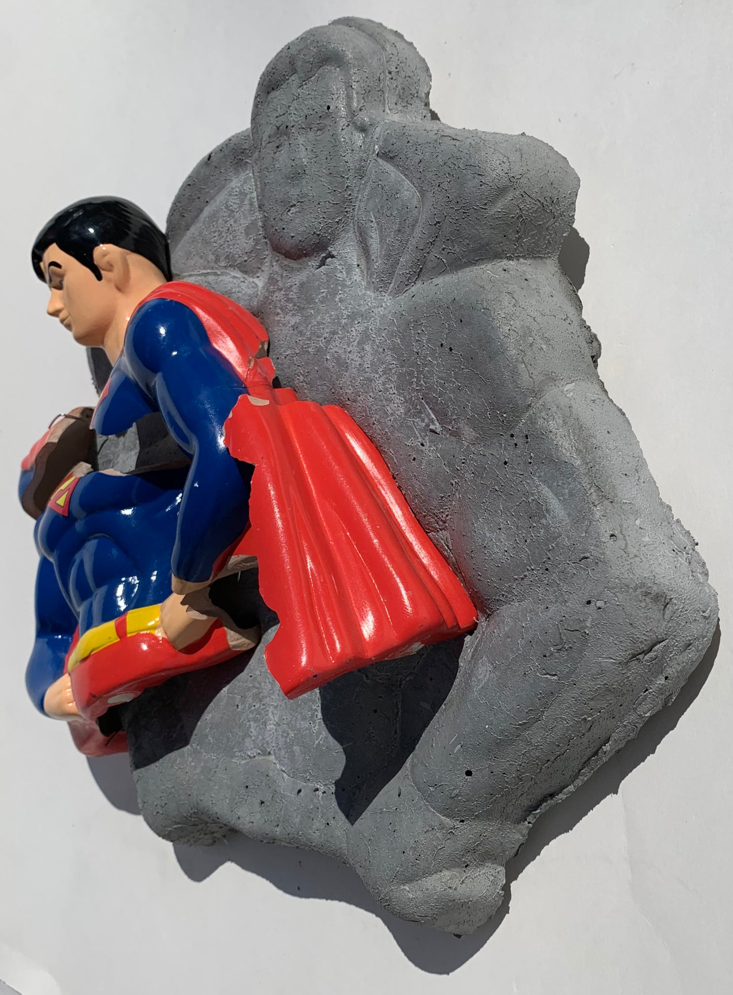 "Slippin' Strongman": Superman on Superman Wall Sculpture