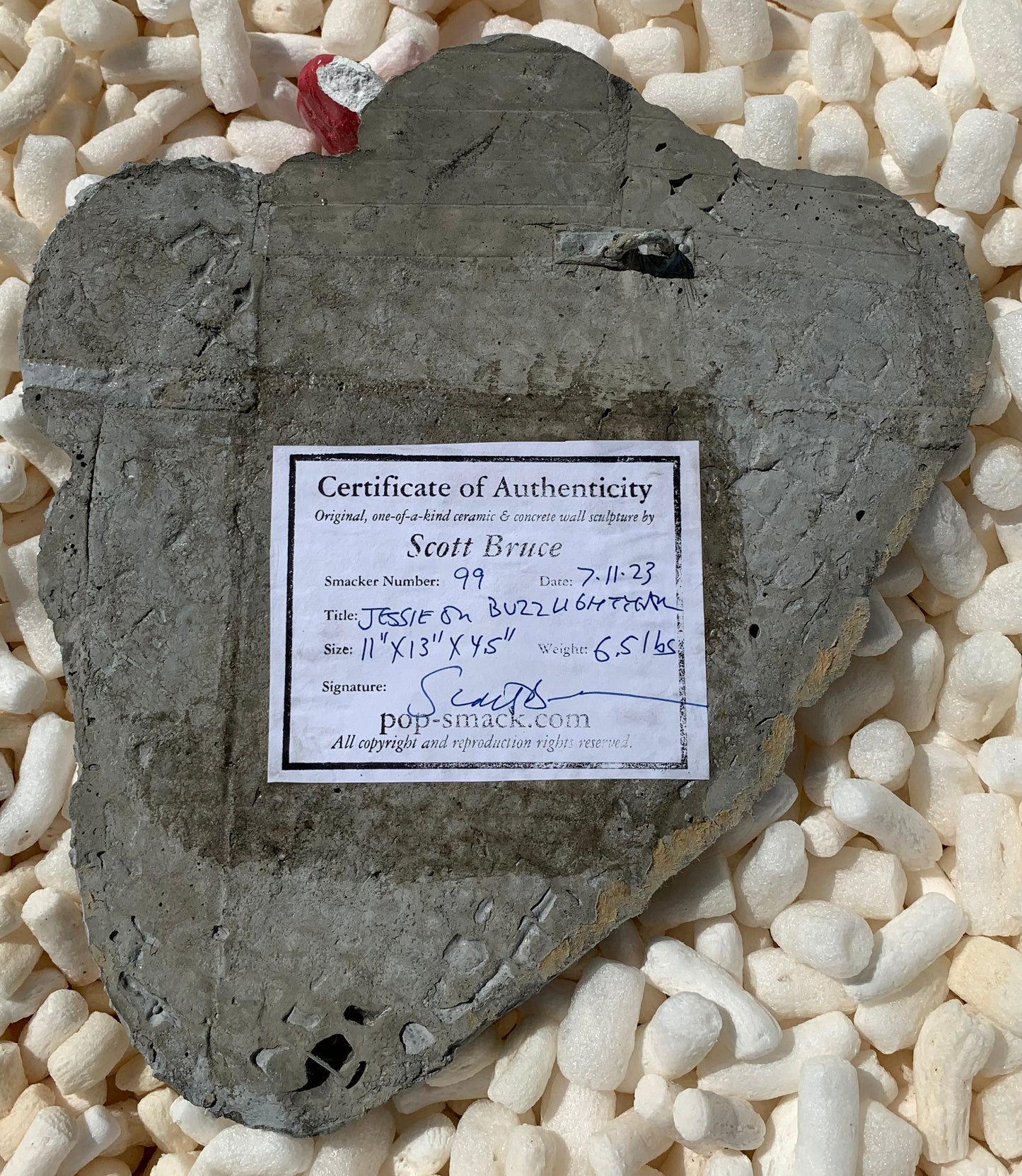 "Cute Cowgirl": Toy Story's Jessie on Buzz Lightyear Wall Sculpture