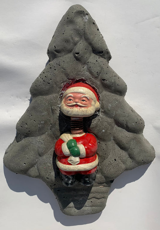 "Spring-Loaded Santa": Bobble Head Santa on Evergreen Tree Wall Sculpture