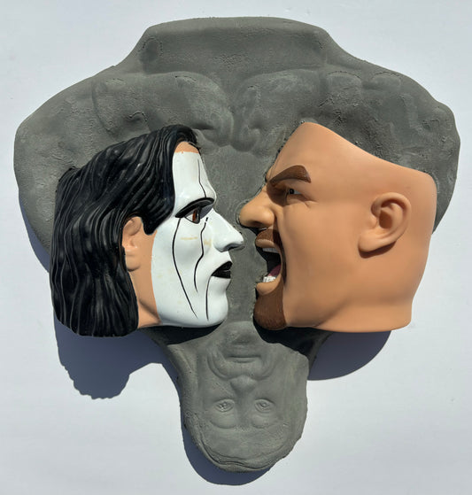 "Face To Face": Sting vs Goldberg on Hulk Hogan Wall Sculpure