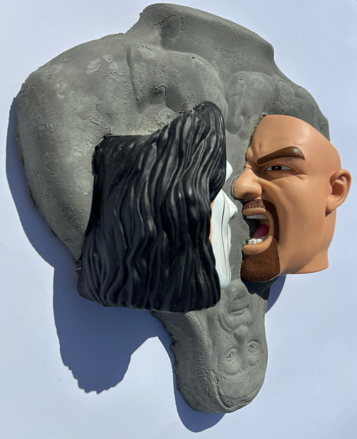 "Face To Face": Sting vs Goldberg on Hulk Hogan Wall Sculpure