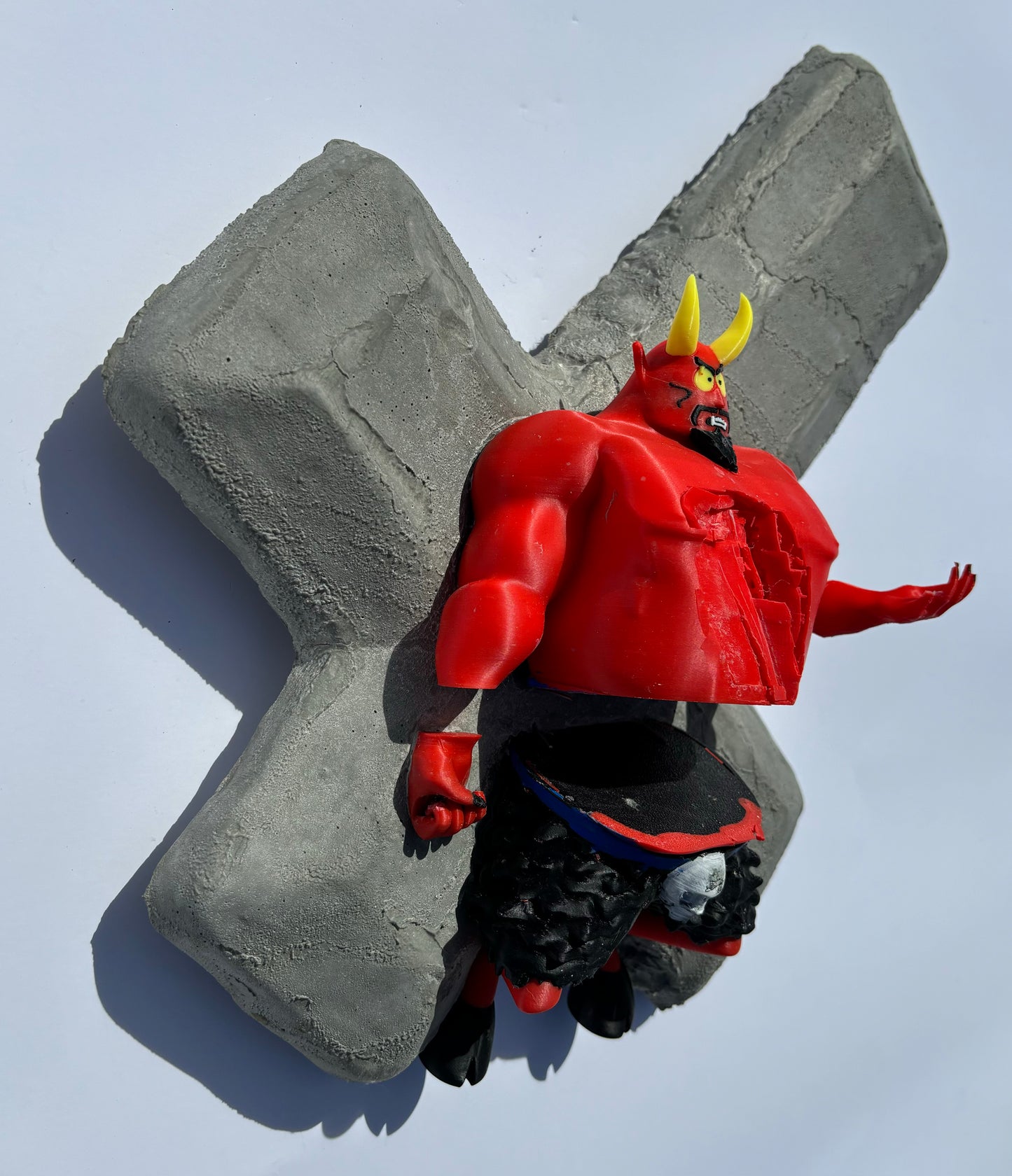 “Saddam’s Lover:” South Park's Satan on Cross Wall Sculpture