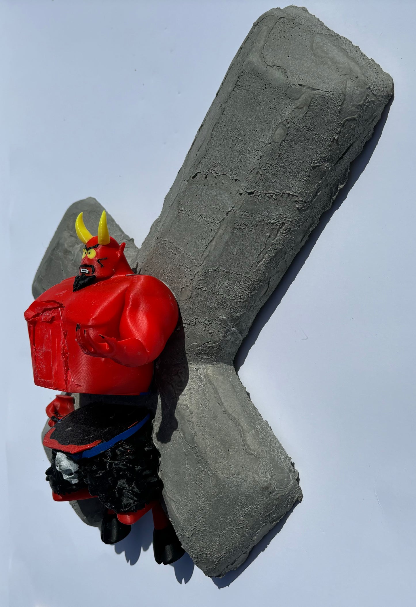 “Saddam’s Lover:” South Park's Satan on Cross Wall Sculpture