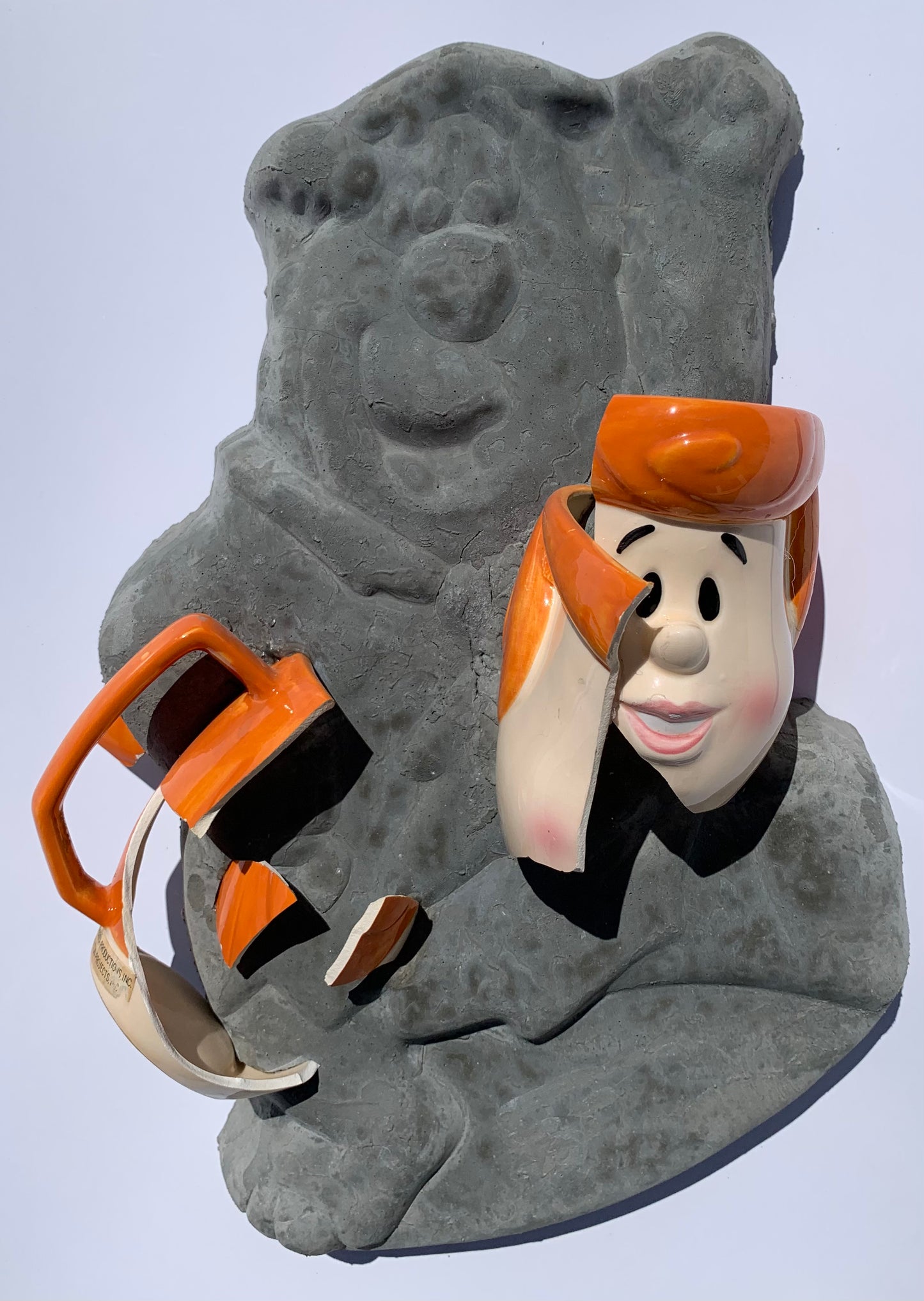 "Rock Solid Marriage": Wilma on Fred Flintstone Wall Sculpture