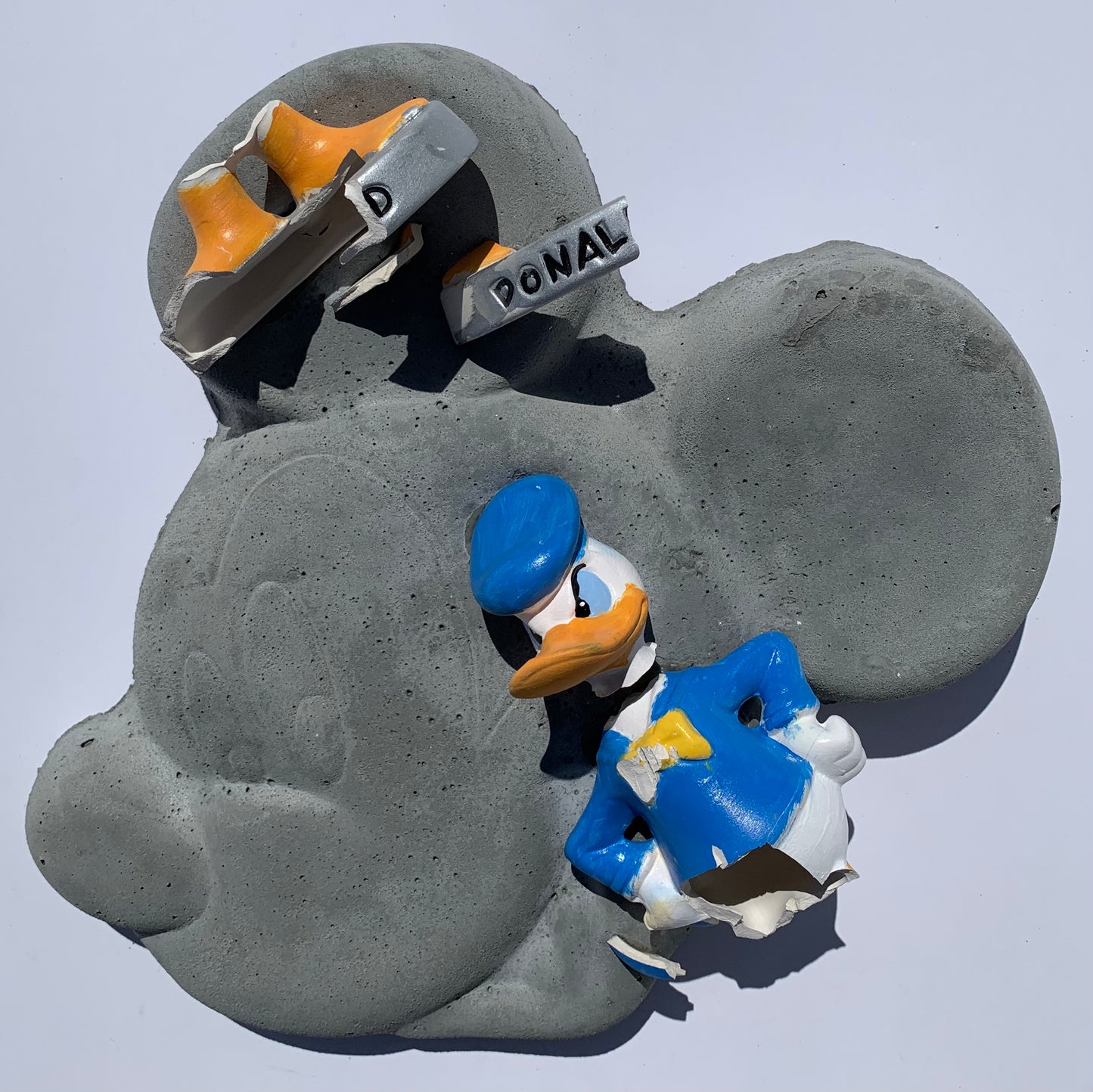 "Anger Management":  Donald Duck on Mickey Mouse Wall Sculpture