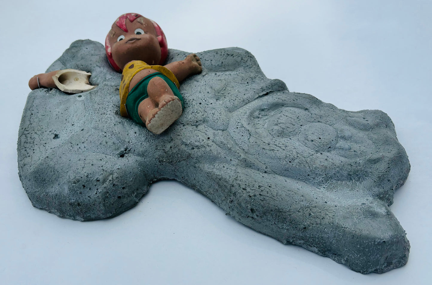 “Fred’s Little Girl”: Pebbles on Fred Flintstone Wall Sculpture