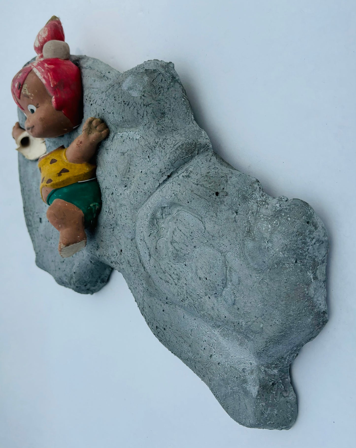 “Fred’s Little Girl”: Pebbles on Fred Flintstone Wall Sculpture