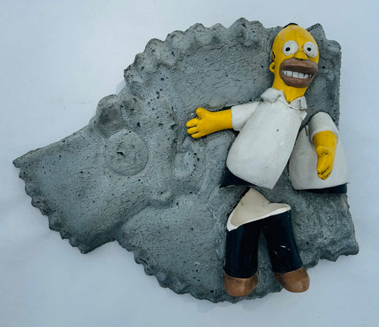 “MAGA Material”: Homer Simpson on Bart Simpson Wall Sculpture