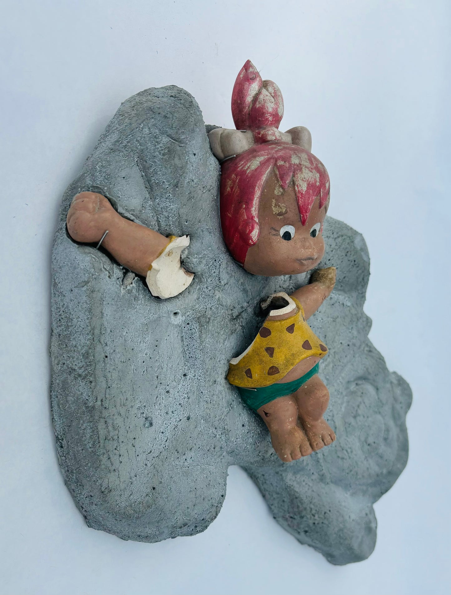 “Fred’s Little Girl”: Pebbles on Fred Flintstone Wall Sculpture