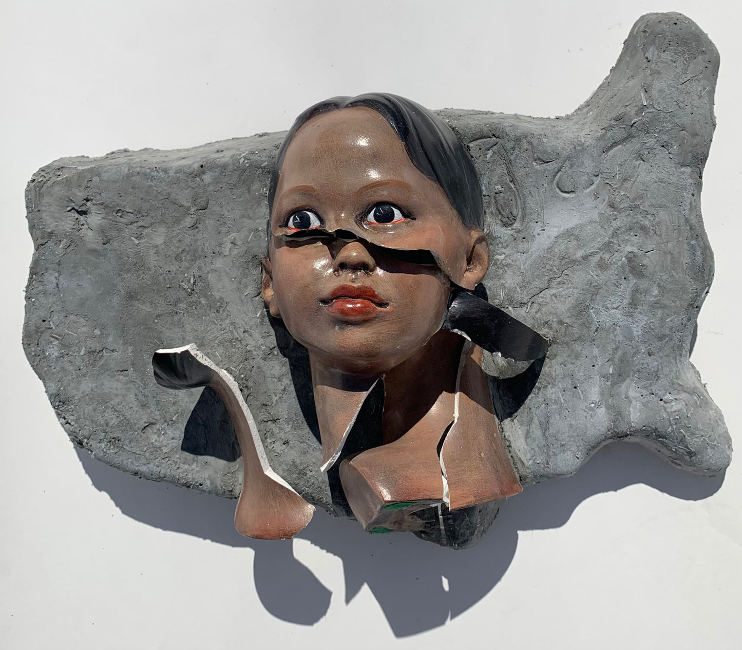 "American Migraine": Black Woman on USA Wall Sculpture