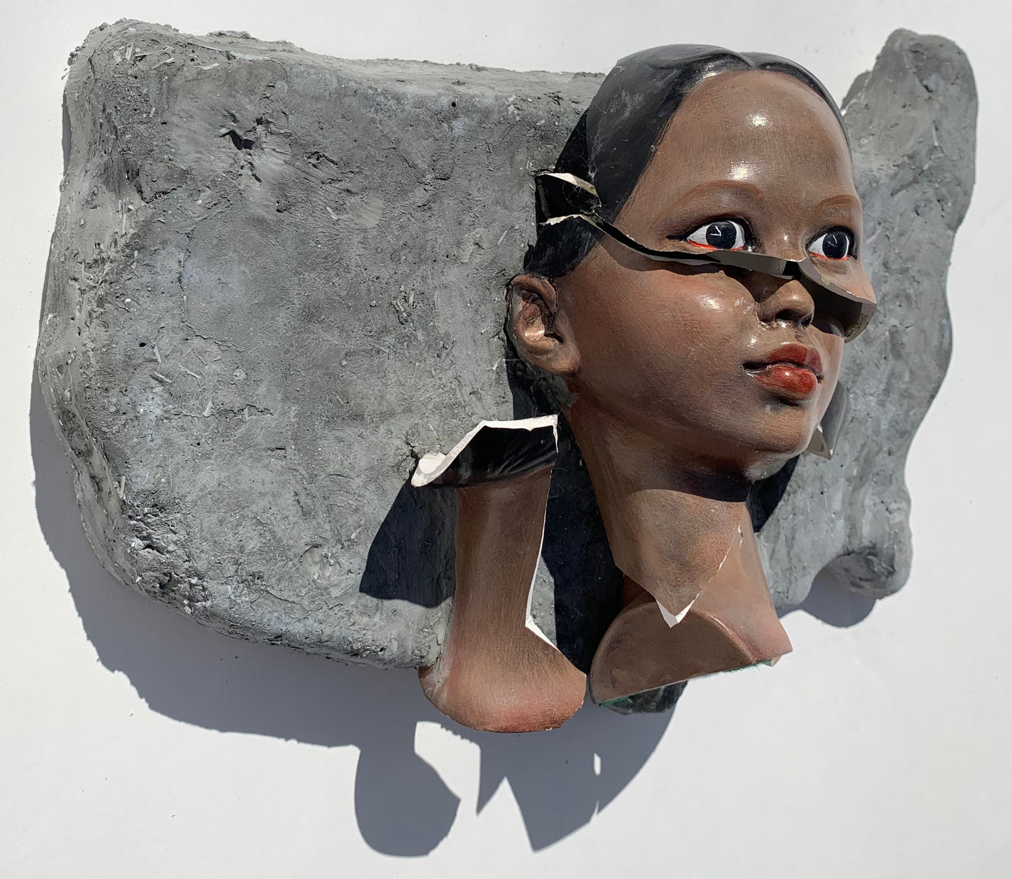 "American Migraine": Black Woman on USA Wall Sculpture