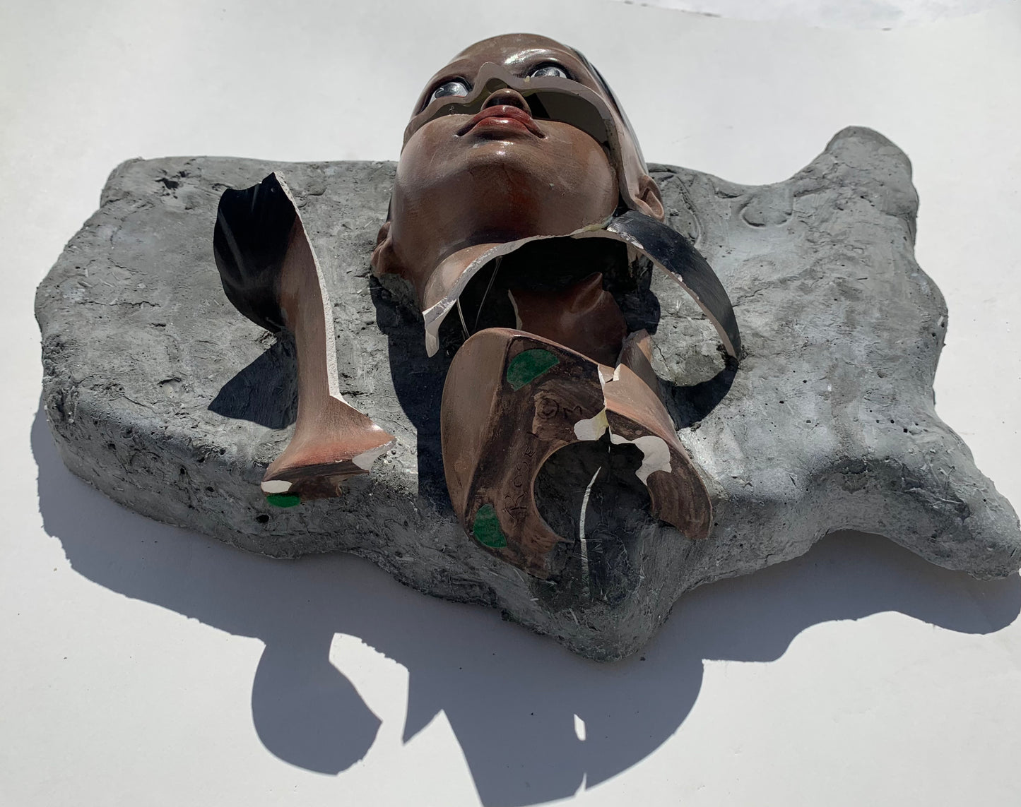 "American Migraine": Black Woman on USA Wall Sculpture