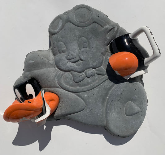 "Pilot Error": Daffy Duck on Porky Pig Wall Sculpture