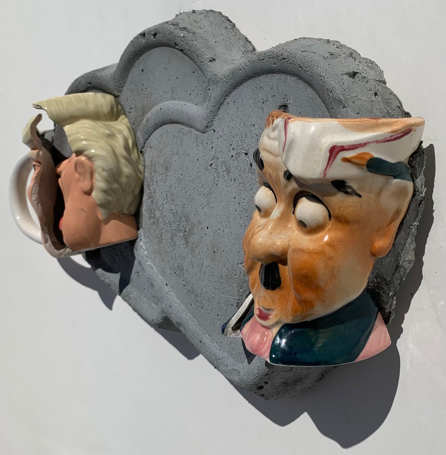 "Both Psychotic!": Trump & German Madman on Two Hearts Wall Sculpture