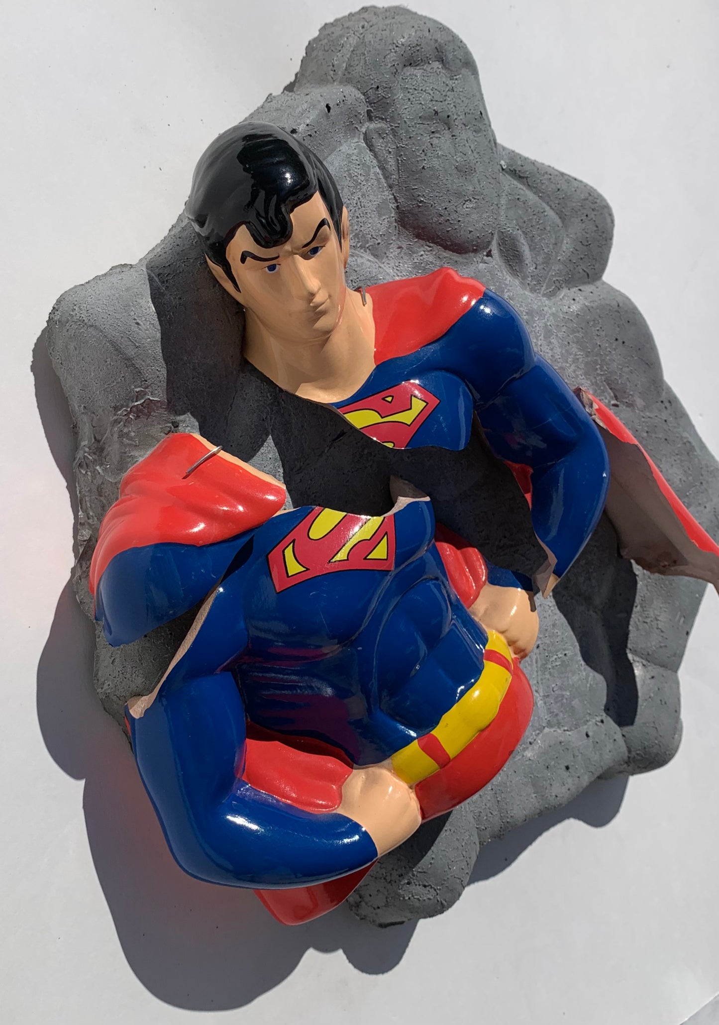 "Slippin' Strongman": Superman on Superman Wall Sculpture