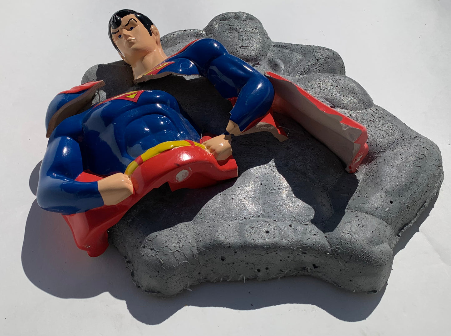 "Slippin' Strongman": Superman on Superman Wall Sculpture