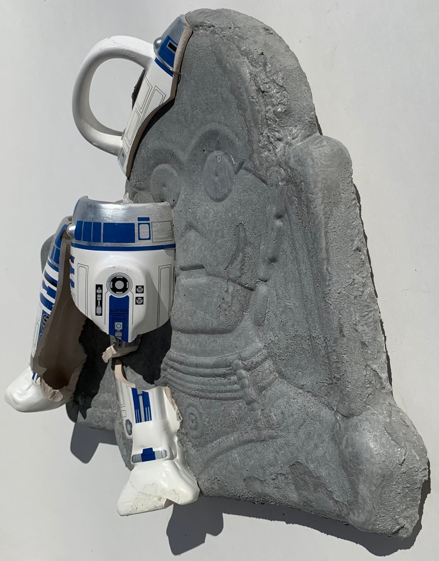 "Cosmic Relief": R2D2 on C3PO Ceramic & Concrete Star Wars Smacker