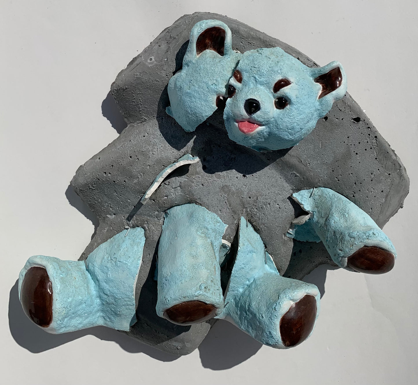 "Teddy's Nemesis": Mean Blue Bear on Whirlwind Wall Sculpture