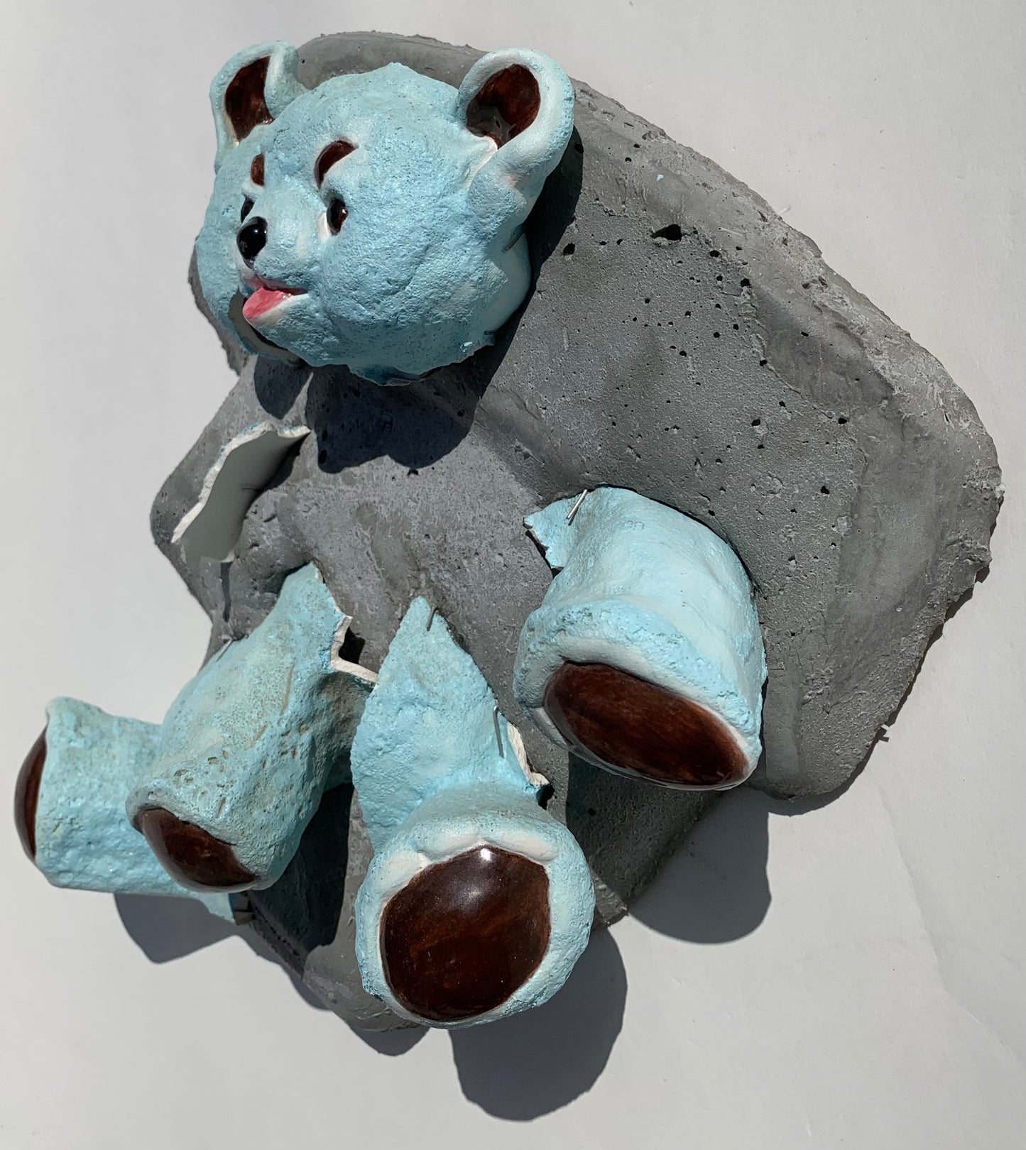 "Teddy's Nemesis": Mean Blue Bear on Whirlwind Wall Sculpture