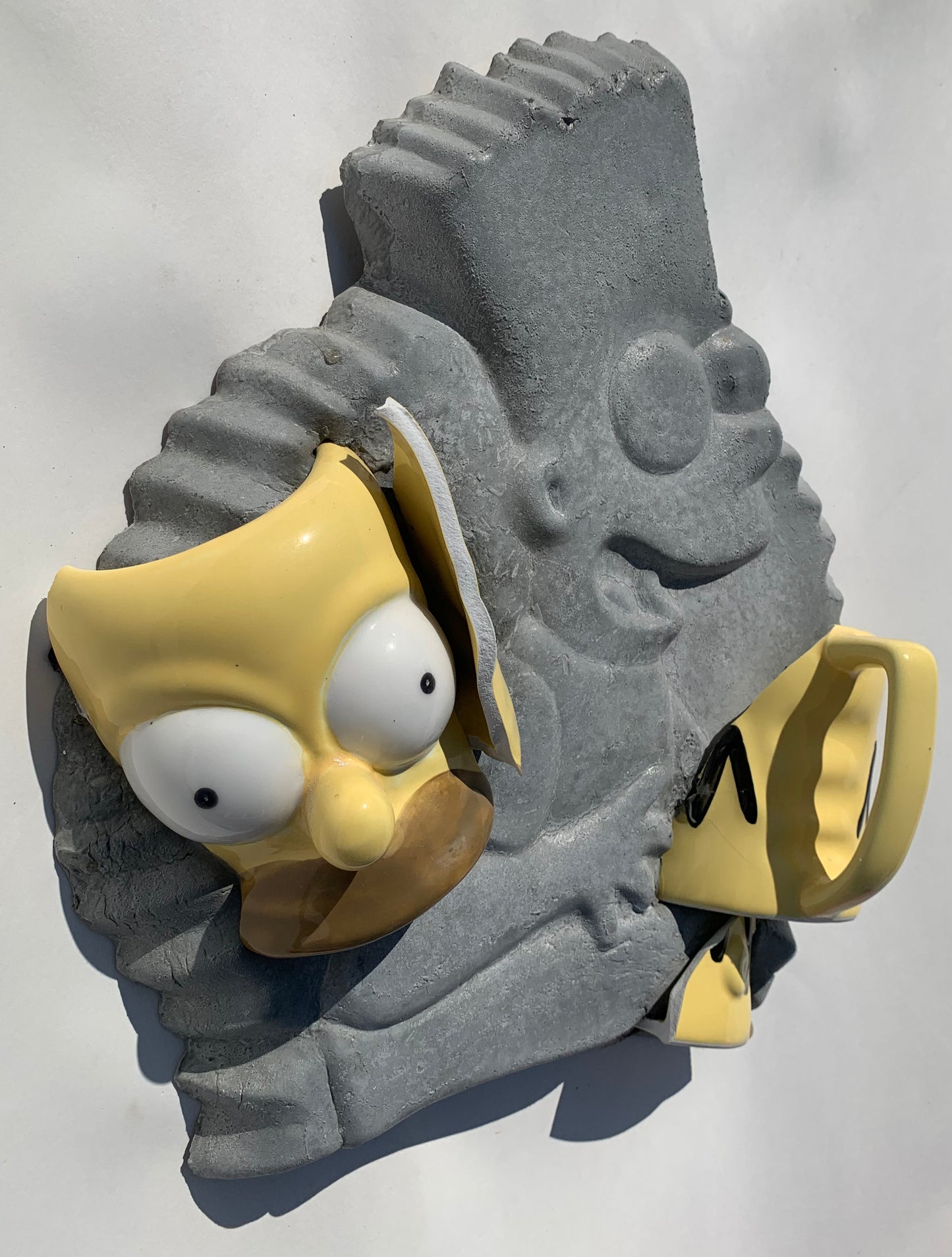 "Homer's Headache": Homer Simpson on Bart Simpson Wall Sculpture