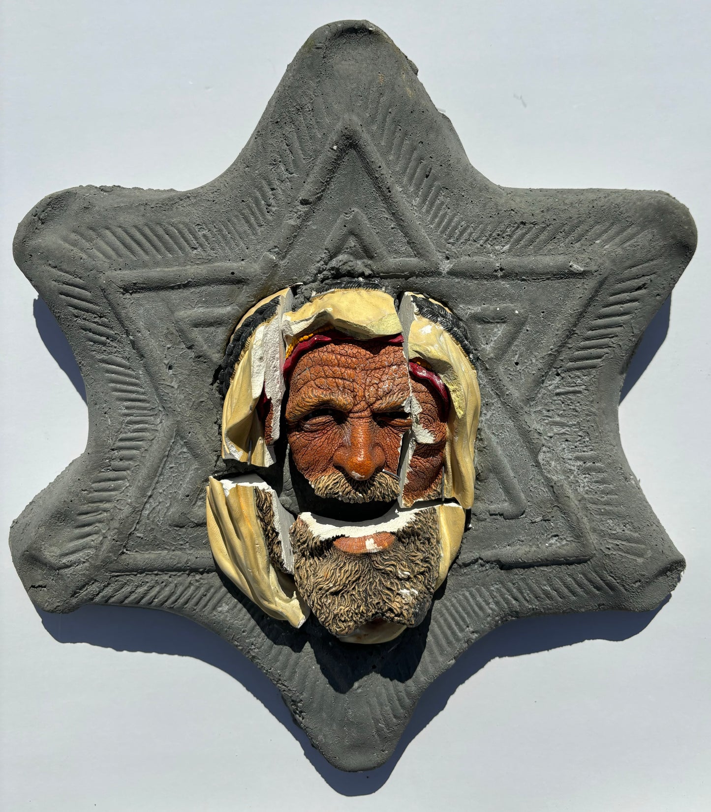 "Wheel of Misfortune": Palestinian on Star-of-David Wall Sculpture