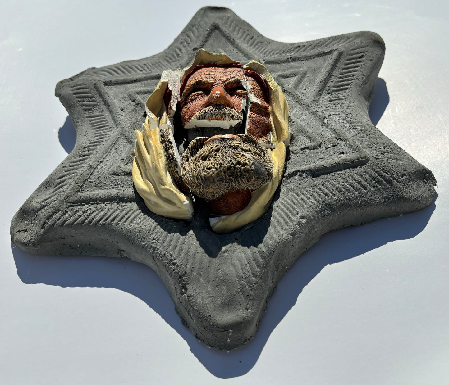 "Wheel of Misfortune": Palestinian on Star-of-David Wall Sculpture