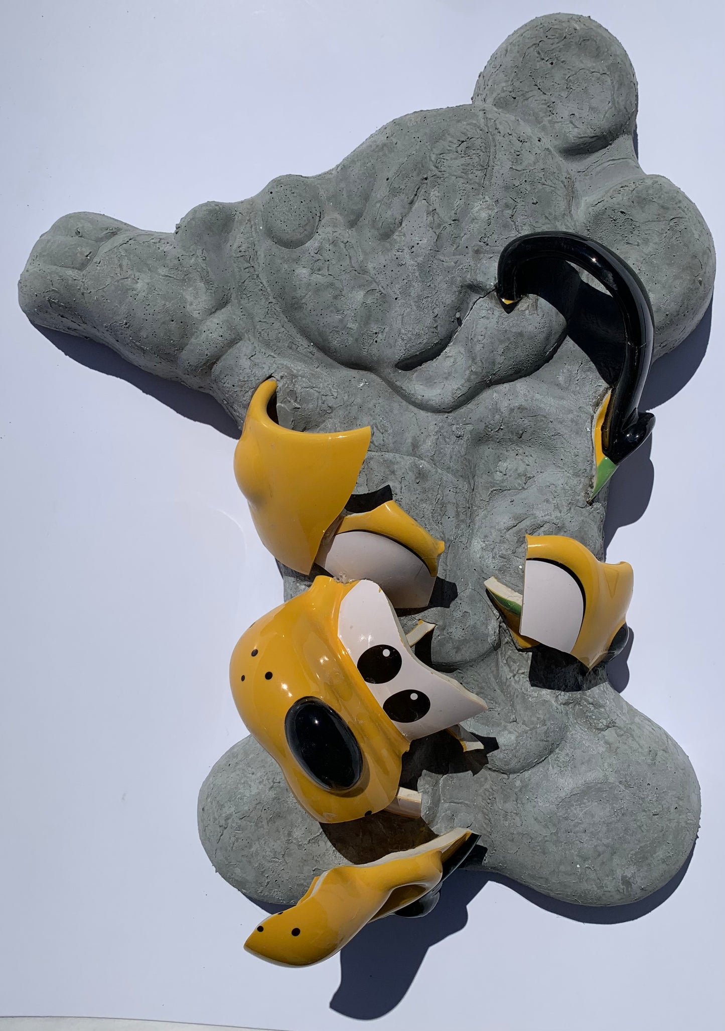 "Doggonit": Pluto on Mickey Mouse Wall Sculpture