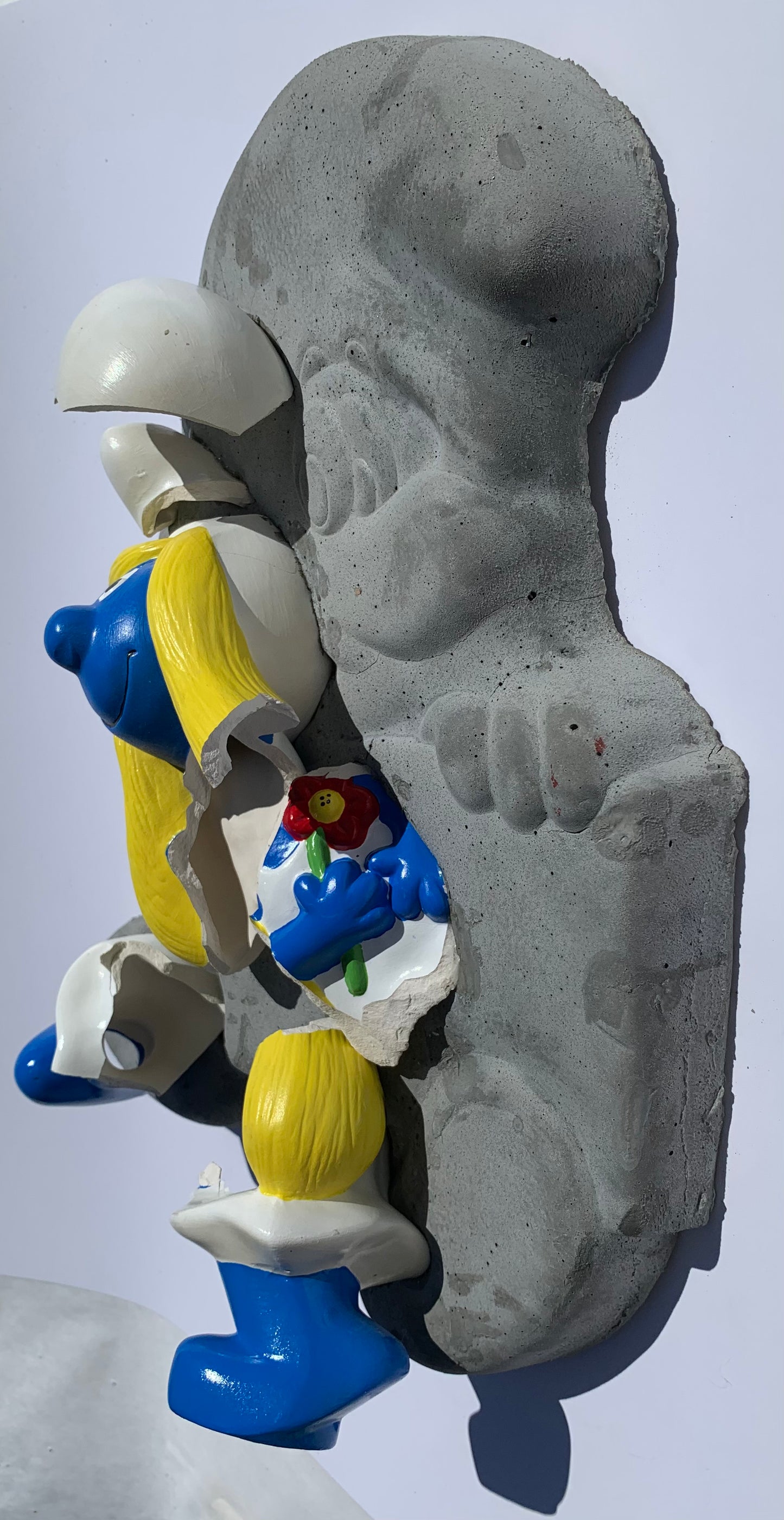 "Smokin' Smurfette": Smurfette on Smurf Wall Sculpture