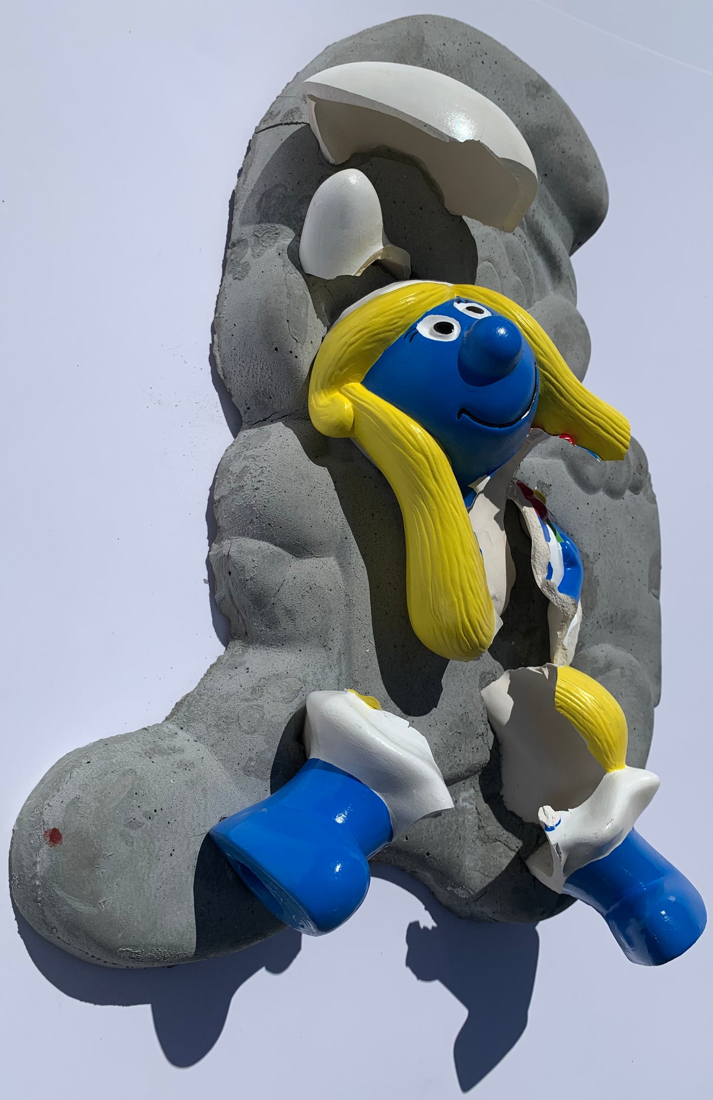 "Smokin' Smurfette": Smurfette on Smurf Wall Sculpture