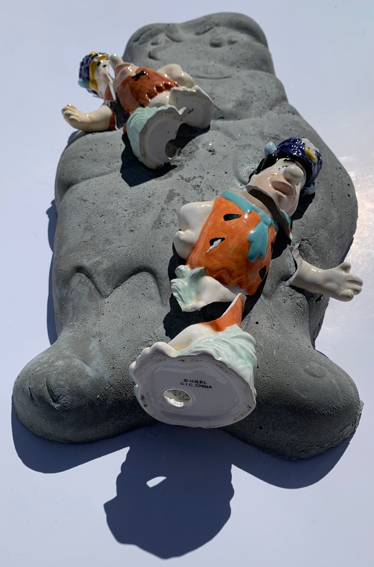 "Water Buffalo Bros" : Barney & Fred on Fred Flintstone Wall Sculpture